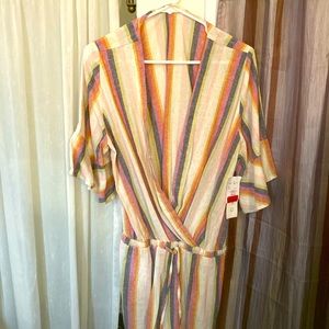 Never Worn. 3 Quarter Sleeve Bathing Suit Cover or Very Low Rise Romper.